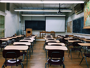 Rows of tables lined up in a room